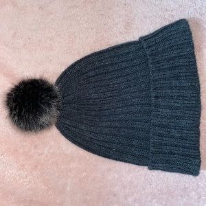 Fuzzy ball hat.